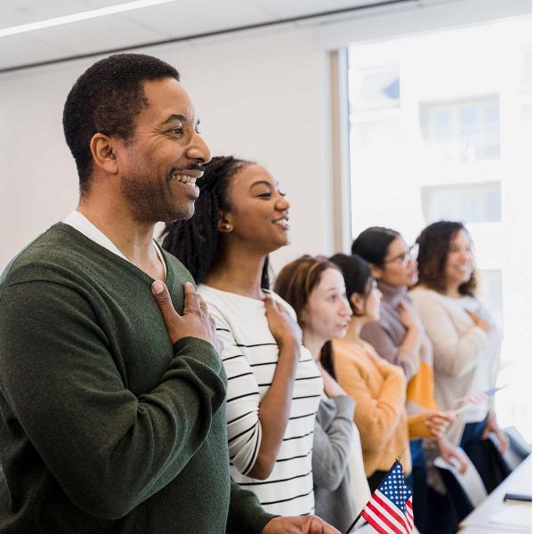 people taking the oath of citizenship